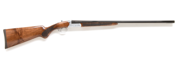 Shotgun with polished wooden stock and blued barrel, featuring intricate silver engravings on the receiver.