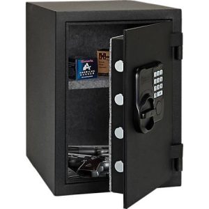 Black safe with a keypad lock, containing firearms and ammunition boxes inside, suitable for securing guns and ammo storage.