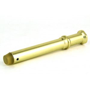Gold-colored metal firearm part with a cylindrical shape, resting on a white surface.