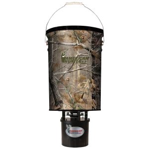 Camo-patterned deer feeder with the logo "American Hunter" in green, featuring branches and leaves in brown and green hues.