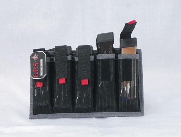 Black and gray ammo bag with multiple compartments and red accents, containing firearm magazines, labeled "g. P. S. "