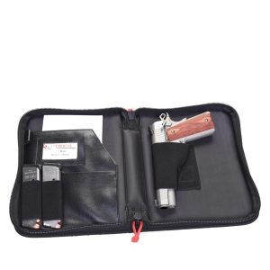Black zippered gun bag open with silver and wood-grip pistol on the right, two ammo clips on the left in black elastic holders, interior pocket with stitching detail.