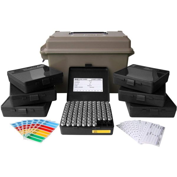 Olive green ammo box with black plastic cases filled with silver rounds, accompanied by colored labels and white load cards, ideal for firearms and ammunition storage in casey, iowa.