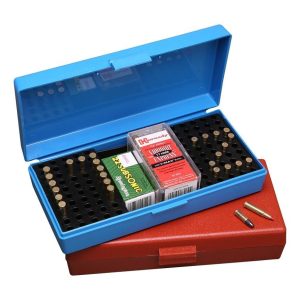 Blue and red ammo boxes with various bullets and cartridges, including Hornady and Remington brands, arranged in separate compartments.
