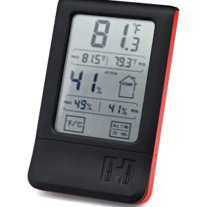 A black and red digital hygrometer displaying temperature and humidity.