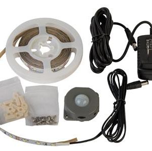 Power adapter with black cable, motion sensor, LED strip on a white spool, and mounting accessories.