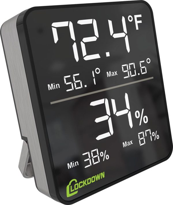 A digital thermometer displaying temperature (72. 4°f) and humidity (34%) with a black front and green "lockdown" logo.