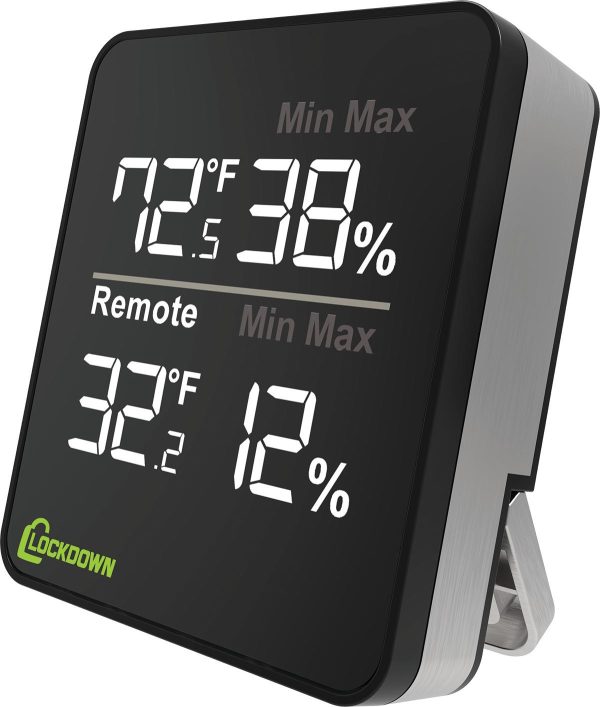 Black and silver digital thermohygrometer displaying temperatures of 72. 5°f and 32°f, and humidity levels of 38% and 12%, with "lockdown" logo in green.