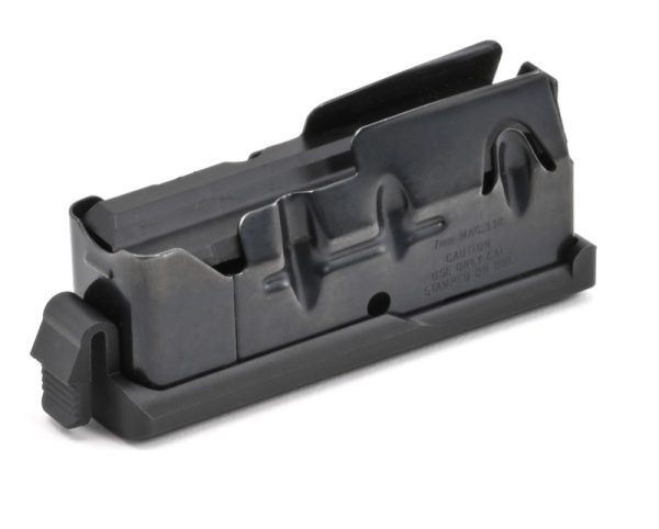 Black firearm magazine on white background.