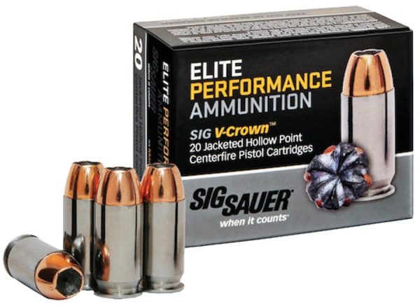 Box of sig sauer elite performance ammunition sig v-crown 20 jacketed hollow point centerfire pistol cartridges with copper and silver bullets, displayed next to the packaging.
