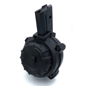 Black drum magazine with a matte finish for firearms, featuring a ribbed exterior and rectangular feeding slot, on a white background.