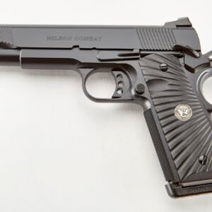 Black wilson combat handgun with textured grip and logo, isolated on white background.