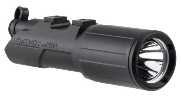 Black tactical flashlight attachment labeled "foxtrot-msr" with a cylindrical design and glossy reflector, suitable for firearms in casey, iowa.
