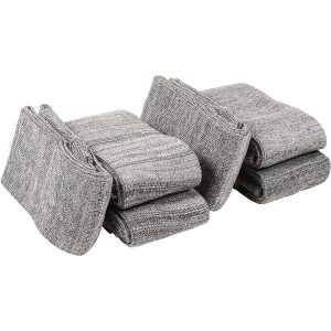 Gray fabric gun socks folded in stacks, suitable for firearm protection and storage.