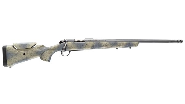 A precision rifle with a marble-patterned, beige and gray stock, black recoil pad, and a long, smooth, matte silver barrel with a muzzle brake.