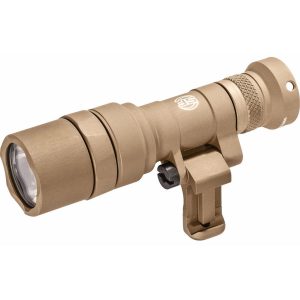 Tactical flashlight in tan color with a knurled grip and mounting bracket, suitable for firearm attachment.