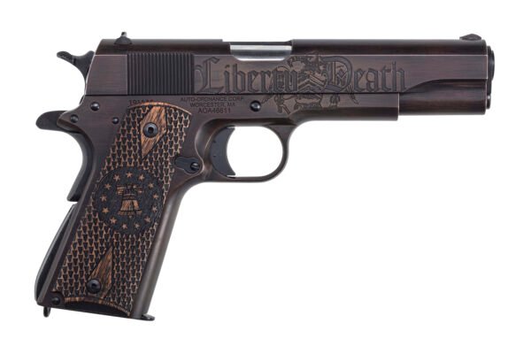 A black handgun with engraved text "liberty or death" and detailed wood-textured grip featuring stars and patterns.