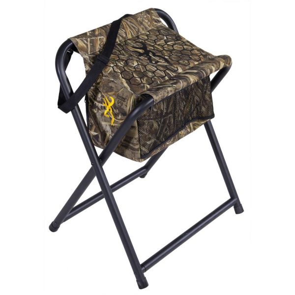 Camouflage folding chair with a storage bag, featuring a yellow logo on the fabric, black metal frame, adjustable strap, suitable for hunting or outdoor activities in casey, iowa.