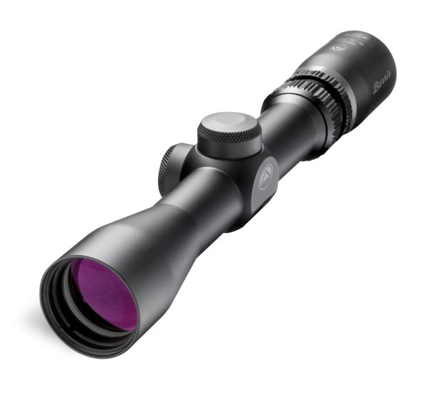 Black rifle scope with purple lens coating, textured adjustment knobs, and branding details.