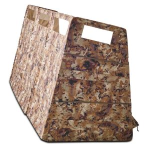Camouflage-patterned hunting blind with carry handles, featuring shades of brown, tan, and green, suitable for firearms and ammo storage in Casey, Iowa.