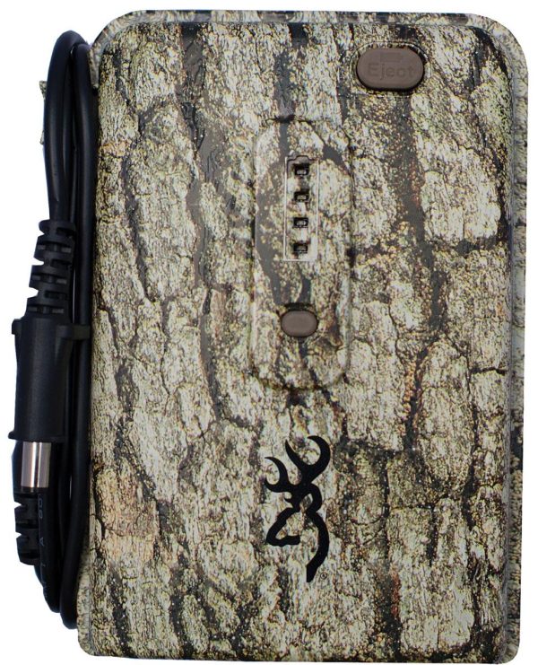 Camo-patterned electronic device with a browning logo, featuring a textured tree bark design in shades of brown and tan, equipped with a power cable.