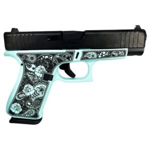 A black and mint green handgun with intricate floral and paisley designs on the grip.