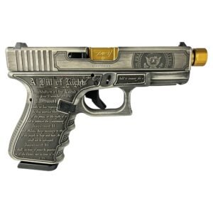 Customized handgun with engraved bill of rights text, featuring a silver finish and gold accents on the slide and barrel, associated with firearms and guns in casey, iowa.