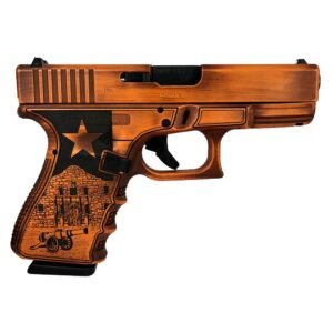 Bronze handgun with black star and alamo engraving on the grip.