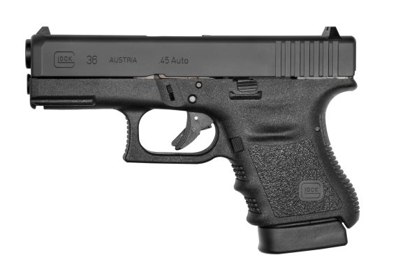 Black glock 36 semi-automatic pistol with textured grip,. 45 acp caliber, on a white background.