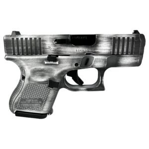 Silver and black handgun with textured grip and engraved details.