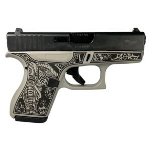 Decorative pistol with intricate black designs on a gray frame, featuring a black slide.