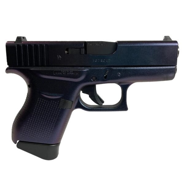 Black semi-automatic handgun with textured grip.