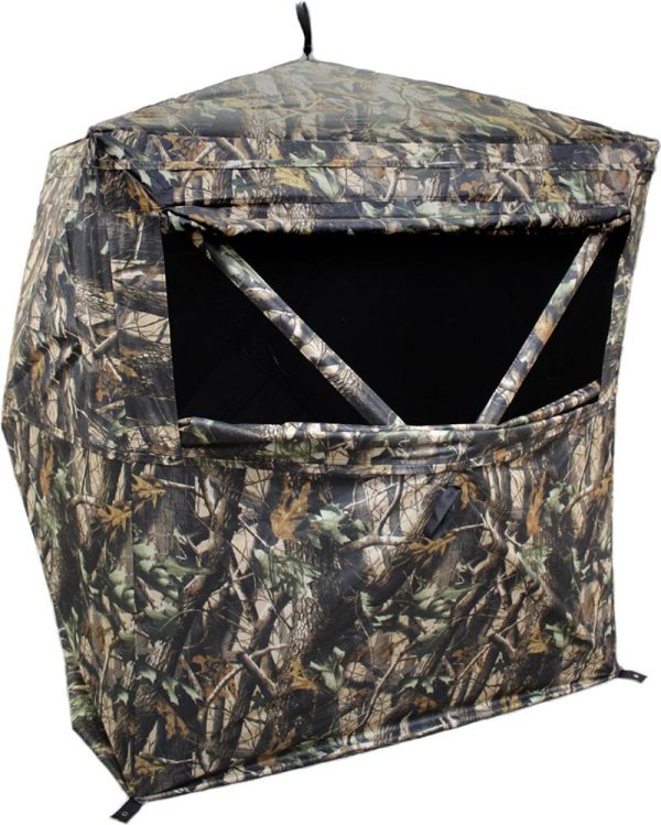 Camouflage outdoor hunting blind with leaf and branch pattern, featuring an open rectangular window at the front.