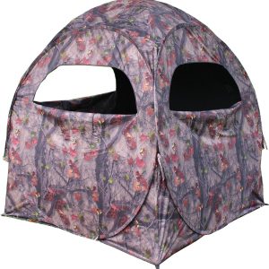 Camouflage hunting blind with a pattern of gray, brown, and red intertwined branches and leaves, featuring large rectangular openings.