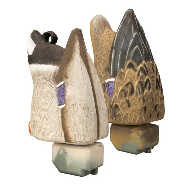 Duck decoys with detailed brown, black, and cream feather patterns on square bases.
