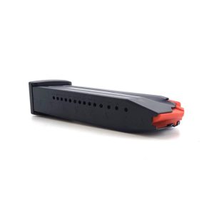 Black firearm magazine with orange baseplate, angled view.
