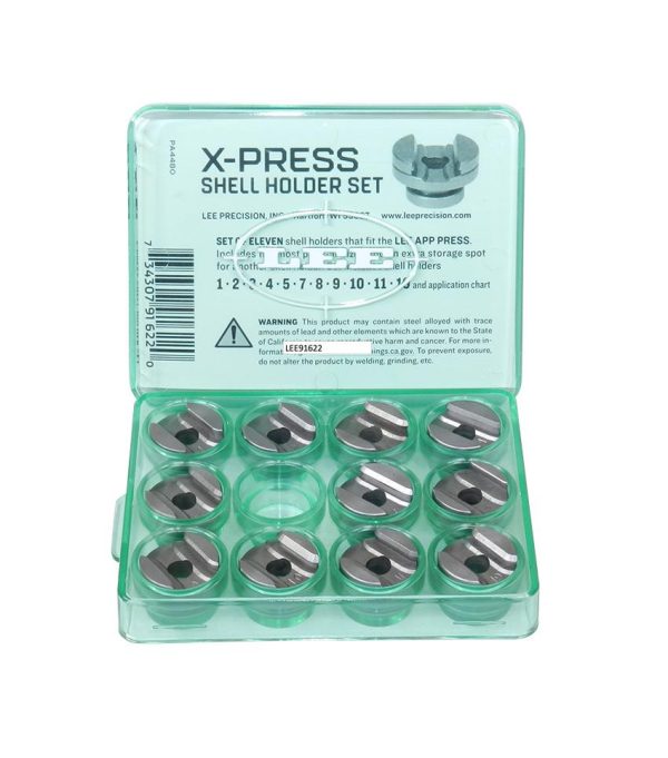 Green plastic case with transparent lid containing a set of eleven silver shell holders arranged in individual compartments, labeled "x-press shell holder set" by lee precision.
