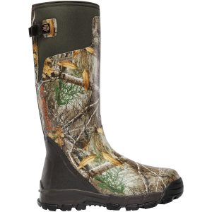 Camouflage hunting boot with earthy green, brown, and tan pattern, featuring black sole and orange "LaCrosse" branding.