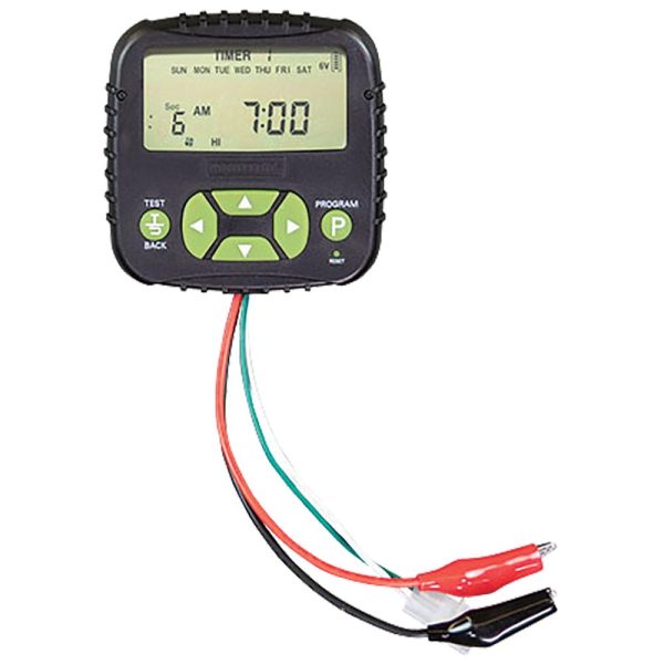 A digital timer with a black casing and green buttons, featuring red, white, and green wires with alligator clips.