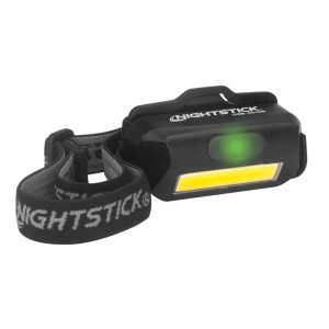 Headlamp with black body, featuring a yellow LED light strip and green indicator, branded with "Nightstick," and an adjustable black and gray headband.