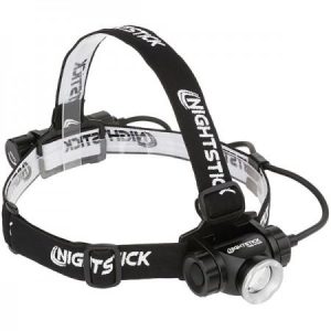 Black and white Nightstick headlamp with adjustable straps and LED light.
