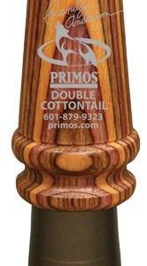 Wooden Primos Double Cottontail hunting call with engraved signature, brass-colored band, and dark brown mouthpiece.