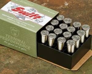 Box of silver bullets with green and white swift packaging, displayed on a textured surface.