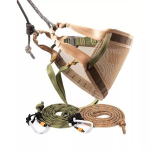 A tan and green outdoor harness with mesh paneling, accompanied by green and orange-brown climbing ropes with attached metal carabiners.