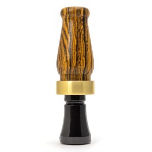 Wooden and black acrylic duck call with a brass band.