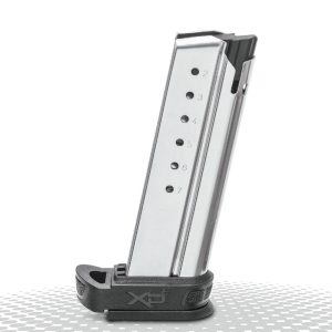 A silver firearm magazine with a black base, featuring seven visible round indicators, against a white background with a dotted pattern.