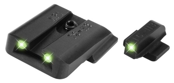 Black gun sights with bright green glowing tritium dots.