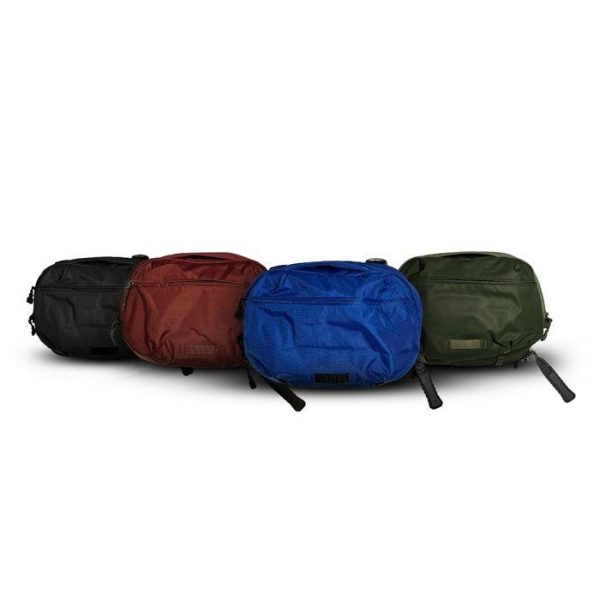 Four tactical bags in black, brown, blue, and green.