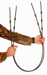 A person wearing a brown camouflage sleeve holding black flexible rods with loops at the end.