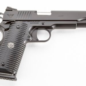 Black wilson combat acp pistol with textured grip, shown on a white background.